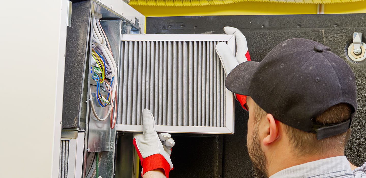 J&K Power Vac employee cleans furnace